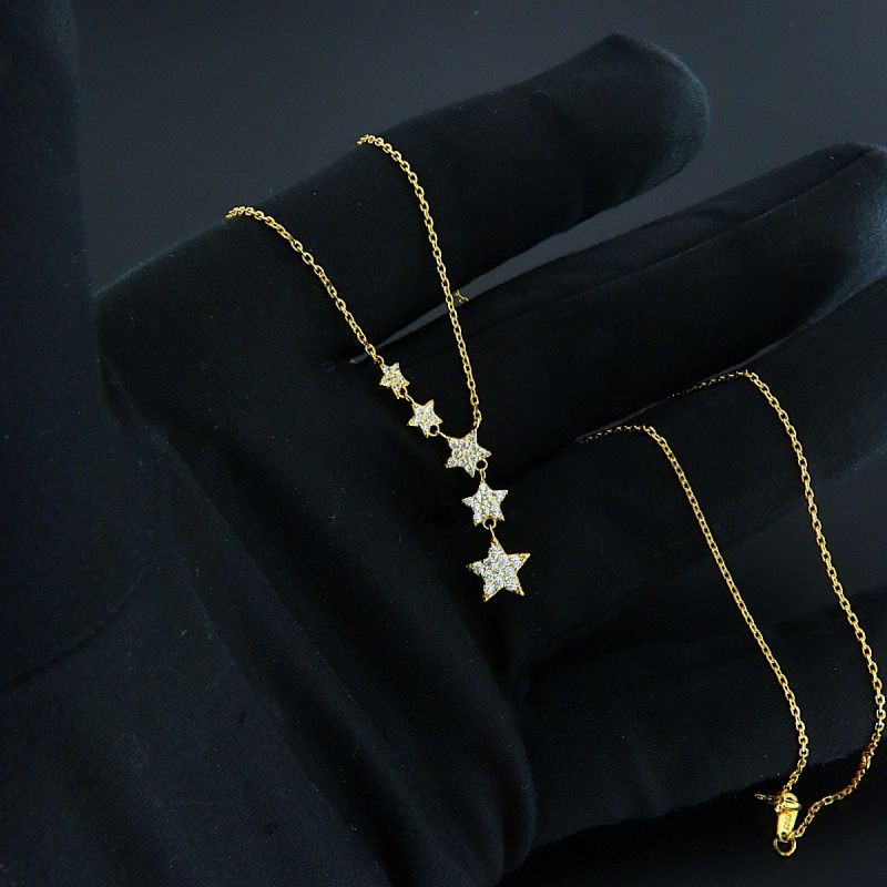 Collana in argento 925‰ dorata con stelle pave' zirconi